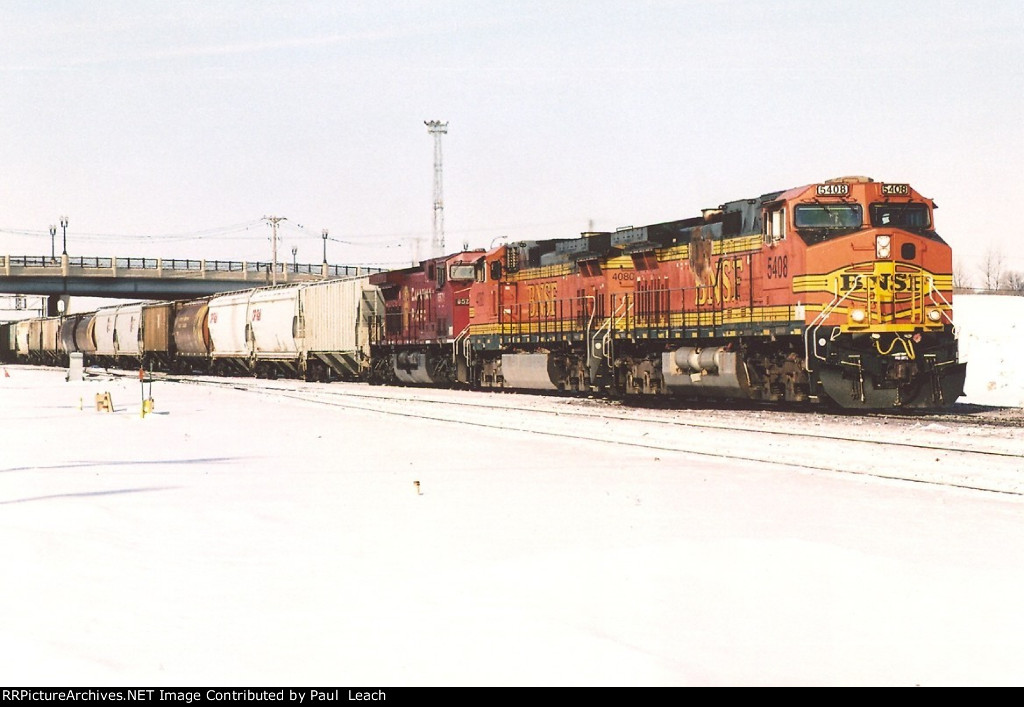 Grain train rolls east